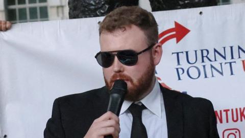 Jack Ross, Chief Operations Officer for Turning Point UK, speaks during a vigil at the Montgomery Statue in Whitehall, to commemorate U.S. conservative activist Charlie Kirk.
