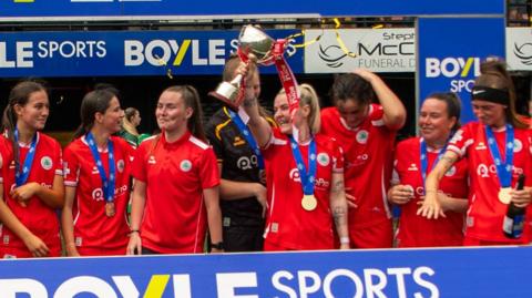 Cliftonville celebrate winning the League Cup