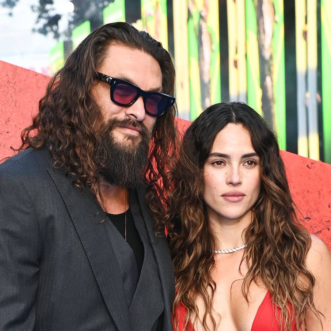 Jason Momoa packs on the PDA with girlfriend at star-studded Supergirl event