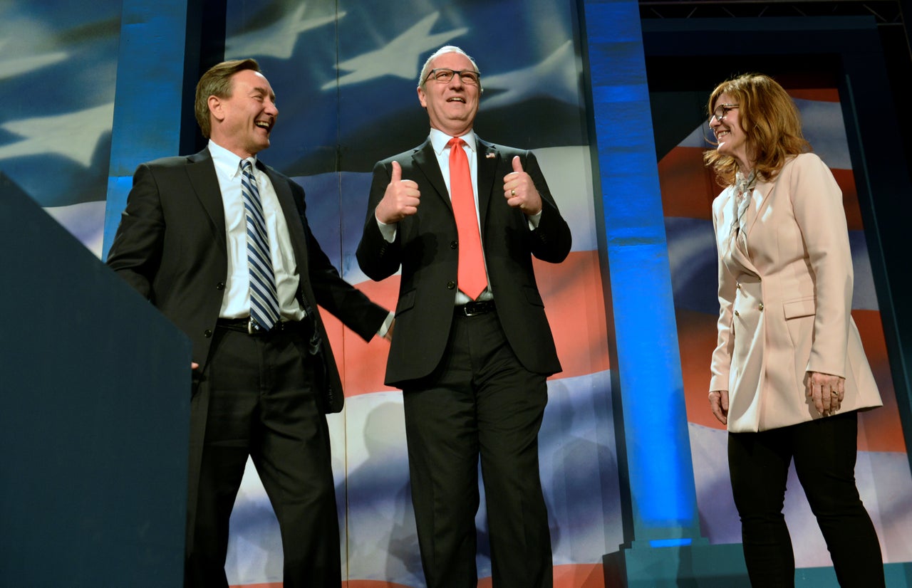 GOP strategists are certain Rep. Kevin Cramer (center, flanked by allies at a party gathering) will defeat Democratic Sen. Heidi Heitkamp in North Dakota.