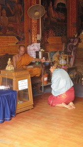 That's me getting blessed by a holy man in Thailand in June.