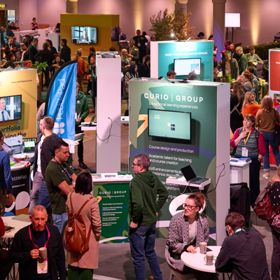 Delegates attending an exhibitor stand.