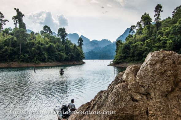 Boatman waiting for passengers, Cheow Lan Lake, Khao Sok National Park, southern Thailand