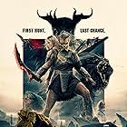 Dimitrius Schuster-Koloamatangi and Elle Fanning in Depredador: Tierras salvajes (2025)