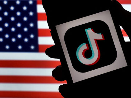 In this photo illustration, the social media application logo, TikTok is displayed on the