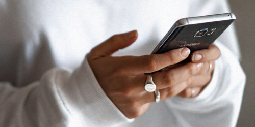 Hands texting on a smartphone | Readable, free readability test