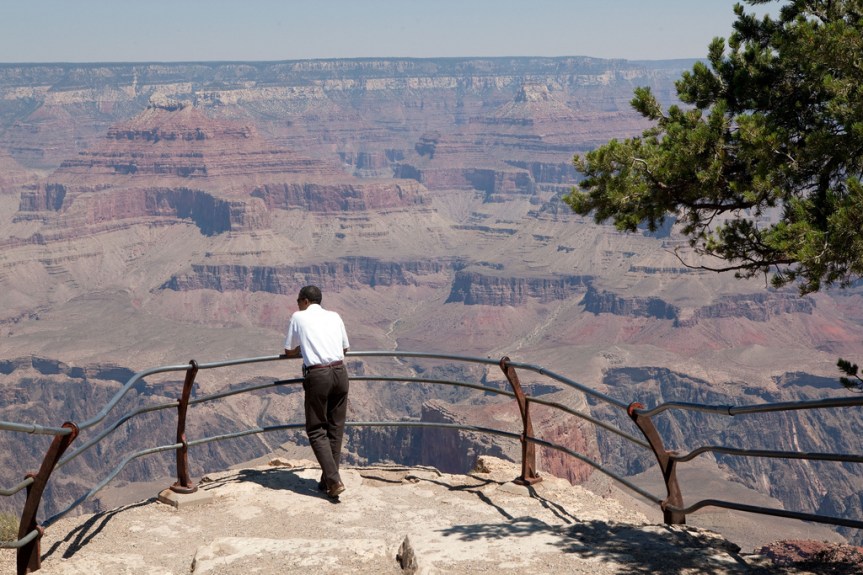 President Barack Obama looks at the vista before him during a tour of the Grand Canyon, August 16, 2009. (Official White House photo by Pete Souza) This official White House photograph is being made available only for publication by news organizations and/or for personal use printing by the subject(s) of the photograph. The photograph may not be manipulated in any way and may not be used in commercial or political materials, advertisements, emails, products, promotions that in any way suggests approval or endorsement of the President, the First Family, or the White House.