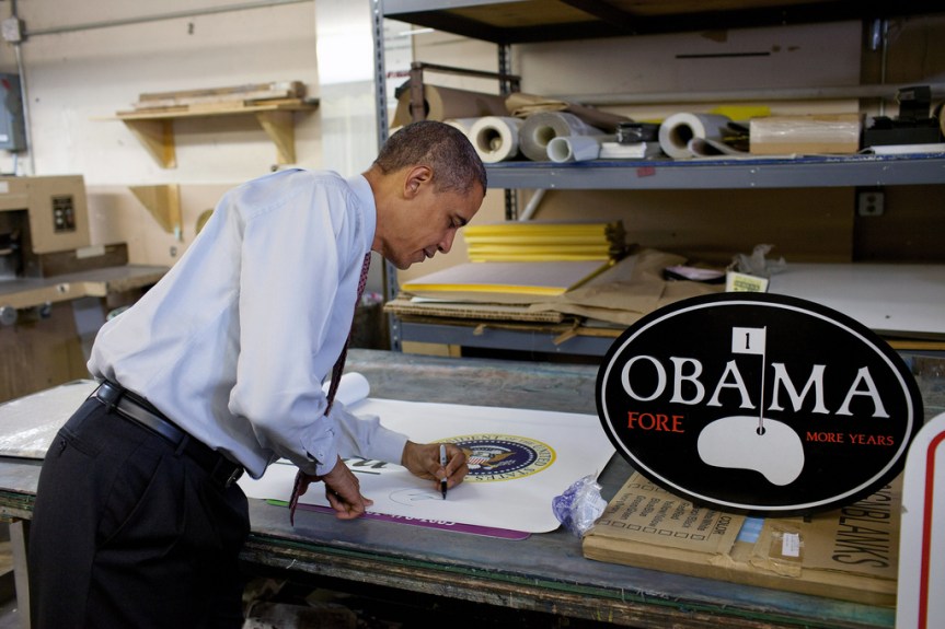 President Barack Obama autographs a banner following his remarks on the economy at Gelberg Signs in Washington, D.C., Aug. 6, 2010. (Official White House Photo by Pete Souza) This official White House photograph is being made available only for publication by news organizations and/or for personal use printing by the subject(s) of the photograph. The photograph may not be manipulated in any way and may not be used in commercial or political materials, advertisements, emails, products, promotions that in any way suggests approval or endorsement of the President, the First Family, or the White House.