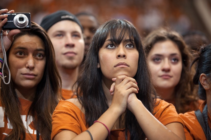 Members of the audience listen as President Barack Obama delivers remarks on higher education and the economy at the University of Texas in Austin, Texas, Aug. 9, 2010. (Official White House Photo by Pete Souza) This official White House photograph is being made available only for publication by news organizations and/or for personal use printing by the subject(s) of the photograph. The photograph may not be manipulated in any way and may not be used in commercial or political materials, advertisements, emails, products, promotions that in any way suggests approval or endorsement of the President, the First Family, or the White House.