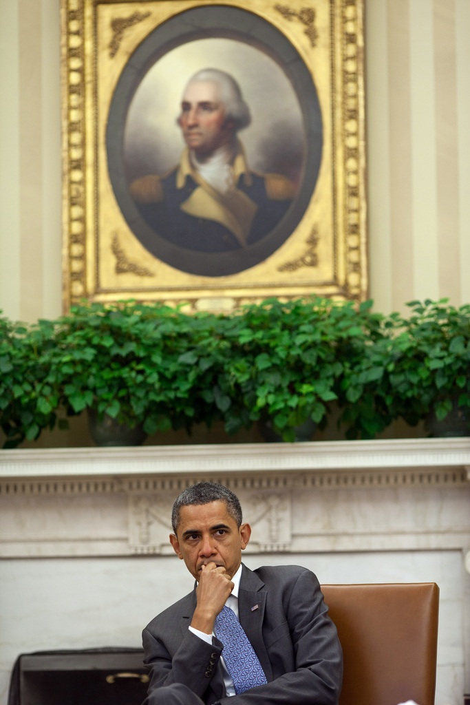 President Barack Obama is briefed during a meeting with senior advisors in the Oval Office, Aug. 18, 2011. (Official White House Photo by Pete Souza) This official White House photograph is being made available only for publication by news organizations and/or for personal use printing by the subject(s) of the photograph. The photograph may not be manipulated in any way and may not be used in commercial or political materials, advertisements, emails, products, promotions that in any way suggests approval or endorsement of the President, the First Family, or the White House.