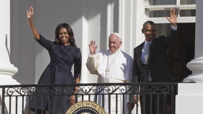 President Barack Obama, first lady Michelle Obama and Pope Francis wave to the crowd on South Lawn of the White House in Washington, Wednesday, Sept. 23, 2015. (AP Photo/Alessandra Tarantino)