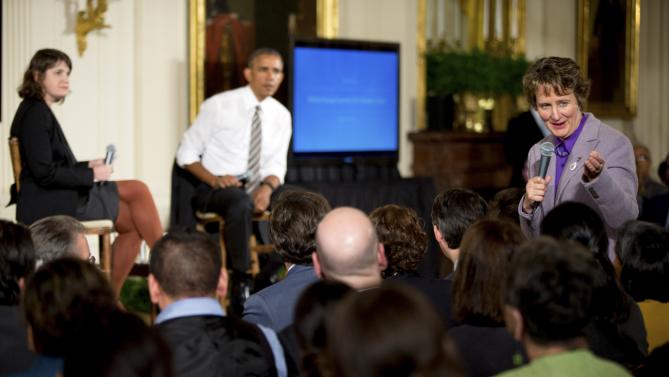 President Barack Obama, second from left, and Michelle Miller, co-founder of coworker.org, left, listen as International President of the Service Employees International Union Mary Kay Henry, right, speaks during a conversation co-hosted by Coworker.org at the White House Summit on Worker Voice, Wednesday, Oct. 7, 2015, in the East Room of the White House in Washington. Workers, employers, unions, organizers and other advocates were meeting on how to energize a new generation of Americans to come together and recognize the potential power of their voice at work. (AP Photo/Andrew Harnik)