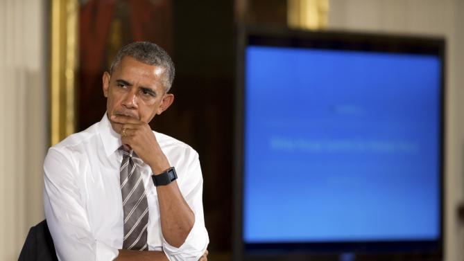 President Barack Obama attends a conversation co-hosted by Coworker.org during the White House Summit on Worker Voice, Wednesday, Oct. 7, 2015, in the East Room of the White House in Washington. Workers, employers, unions, organizers and other advocates were meeting on how to energize a new generation of Americans to come together and recognize the potential power of their voice at work. (AP Photo/Andrew Harnik)