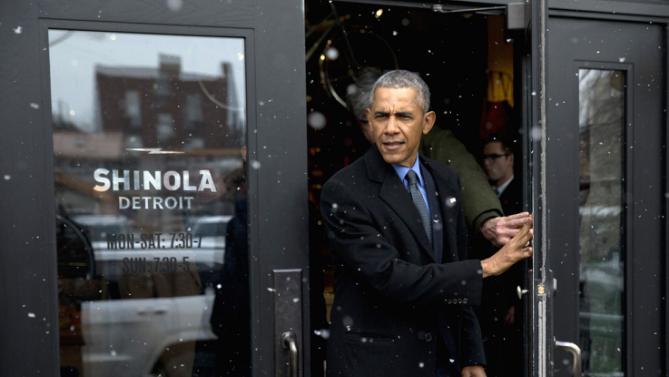 President Barack Obama leaves Shinola, a domestic manufacturer of watches and other goods after a tour, Wednesday, Jan. 20, 2016, in Detroit. While in Detroit the president is scheduled to visit the 2016 North American International Auto Show and speak of the progress made by the city, its people and neighborhoods, and the American auto industry. (AP Photo/Carolyn Kaster)