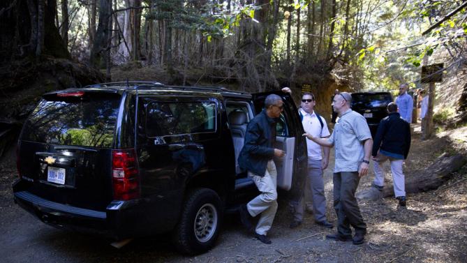 President Barack Obama steps out of his vehicle at Parque Llao Llao which is part of the Parque Nacional Nahuel Haupi in Bariloche, Argentina, Thursday, March 24, 2016. Obama and first family are taking the Villa Tacul Trail and spending the remainder of the afternoon in Bariloche, a picturesque city in southern Argentina, before departing for Washington.(AP Photo/Pablo Martinez Monsivais)