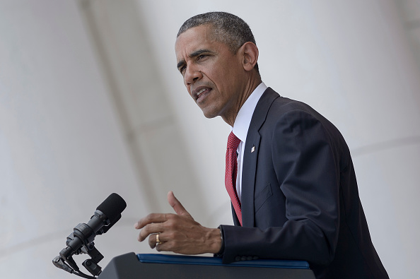 US President Barack Obama speaks during an event to honor Memorial Day at Arlington National Cemetery on May 30, 2016 in Arlington, Virginia. / AFP / Brendan Smialowski (Photo credit should read BRENDAN SMIALOWSKI/AFP/Getty Images)