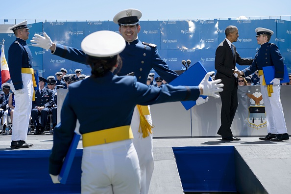 US President Barack Obama congratulates cadets during a graduation ceremony at the US Air Force Academy's Falcon Stadium June 2, 2016 in Colorado Springs, Colorado. / AFP / Brendan Smialowski (Photo credit should read BRENDAN SMIALOWSKI/AFP/Getty Images)