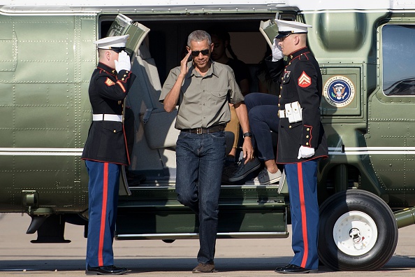 US President Barack Obama gets out from Marine One helicopter to board Air Force One at Roswell International Air Center June 17, 2016 in Roswell, New Mexico. / AFP / Brendan Smialowski (Photo credit should read BRENDAN SMIALOWSKI/AFP/Getty Images)