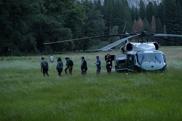 US President Barack Obama and the first family walk through Ahwahnee Meadow June 17, 2016 in Yosemite Vally, California. / AFP / Brendan Smialowski (Photo credit should read BRENDAN SMIALOWSKI/AFP/Getty Images)
