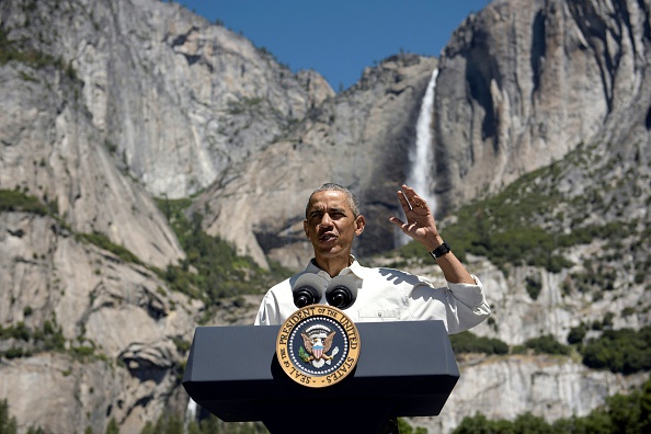 US President Barack Obama speaks while celebrating the 100th anniversary of the US National Parks system at Yosemite National Park, California, on June 18, 2016. / AFP / Brendan Smialowski (Photo credit should read BRENDAN SMIALOWSKI/AFP/Getty Images)