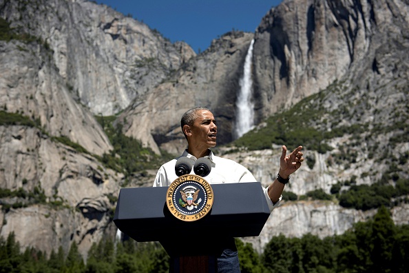 US President Barack Obama speaks while celebrating the 100th anniversary of the US National Parks system at Yosemite National Park, California, on June 18, 2016. / AFP / Brendan Smialowski (Photo credit should read BRENDAN SMIALOWSKI/AFP/Getty Images)