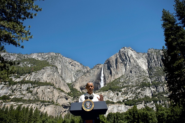 US President Barack Obama speaks while celebrating the 100th anniversary of the US National Parks system at Yosemite National Park, California, on June 18, 2016. / AFP / Brendan Smialowski (Photo credit should read BRENDAN SMIALOWSKI/AFP/Getty Images)