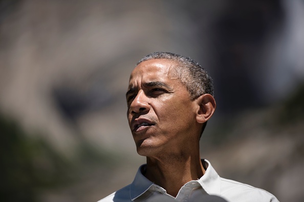 US President Barack Obama speaks while celebrating the 100th anniversary of the US National Parks system at Yosemite National Park, California, on June 18, 2016. / AFP / Brendan Smialowski (Photo credit should read BRENDAN SMIALOWSKI/AFP/Getty Images)