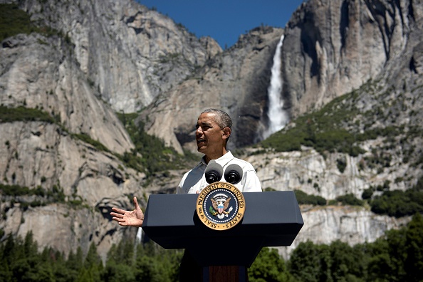 US President Barack Obama speaks while celebrating the 100th anniversary of the US National Parks system at Yosemite National Park, California, on June 18, 2016. / AFP / Brendan Smialowski (Photo credit should read BRENDAN SMIALOWSKI/AFP/Getty Images)