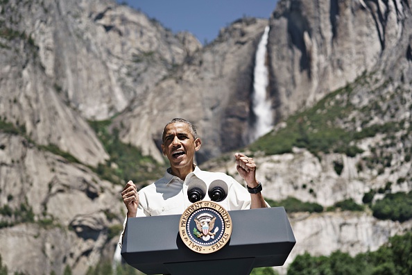 US President Barack Obama speaks while celebrating the 100th anniversary of the US National Parks system at Yosemite National Park, California, on June 18, 2016. / AFP / Brendan Smialowski (Photo credit should read BRENDAN SMIALOWSKI/AFP/Getty Images)