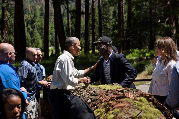 US President Barack Obama greets guests after speaking while celebrating the 100th anniversary of the US National Parks system at Yosemite National Park, California, on June 18, 2016. / AFP / Brendan Smialowski (Photo credit should read BRENDAN SMIALOWSKI/AFP/Getty Images)