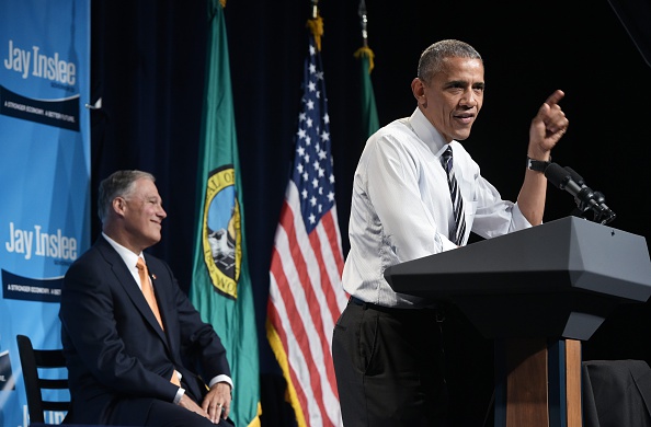 US President Barack Obama speaks during a fundraiser for Washington Governor Jay Inslee (L) at the Washington State Convention Center in Seattle, Washington on June 24, 2016. / AFP / MANDEL NGAN (Photo credit should read MANDEL NGAN/AFP/Getty Images)