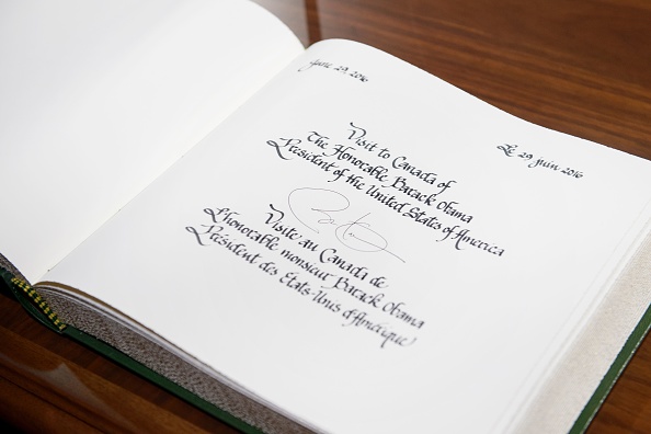 US President Barack Obama's signature is seen in a guest book at Parliament Hill while attending the North American Leaders Summit on June 29, 2016 in Ottawa, Ontario. / AFP / Brendan Smialowski (Photo credit should read BRENDAN SMIALOWSKI/AFP/Getty Images)