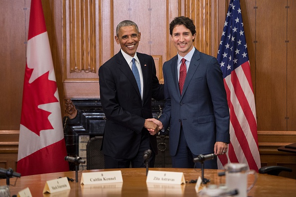 US President Barack Obama (L) and Canadian Prime Minister Justin Trudeau shake hands before a meeting in the Cabinet Room at Parliament Hill while attending the North American Leaders Summit on June 29, 2016 in Ottawa, Ontario. / AFP / Brendan Smialowski (Photo credit should read BRENDAN SMIALOWSKI/AFP/Getty Images)