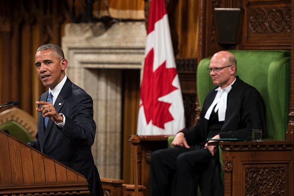 US President Barack Obama addresses Parliament in the House of Commons Chamber on Parliament Hill while attending the North American Leaders Summit and Leaders Summit June 29, 2016 in Ottawa, Ontario. / AFP / Brendan Smialowski (Photo credit should read BRENDAN SMIALOWSKI/AFP/Getty Images)