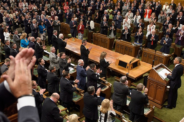 US President Barack Obama addresses Parliament in the House of Commons Chamber on Parliament Hill while attending the North American Leaders Summit on June 29, 2016 in Ottawa, Ontario. / AFP / Brendan Smialowski (Photo credit should read BRENDAN SMIALOWSKI/AFP/Getty Images)