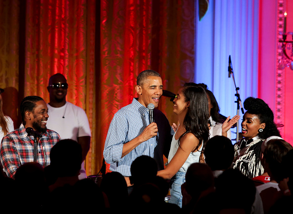 WASHINGTON, DC - JULY 4: President Barack Obama hugs his daughter Malia Obama at the Fourth of July White House party on July 4, 2016 in Washington, DC. Maila Obama celebrated her 18th birthday during the party, which featured guests including singers Janelle Monae and Kendrick Lamar. (Photo by Aude Guerrucci-Pool/Getty Images)