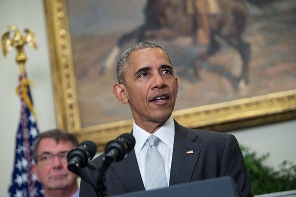US President Barack Obama delivers a statement on Afghanistan with Defense Secretary Ashton Carter (L) at the White House in Washington, DC, on July 6, 2016. Obama announced that 8,400 US troops will remain in Afghanistan into 2017 in light of the still "precarious" security situation in the war-ravaged country. / AFP / NICHOLAS KAMM (Photo credit should read NICHOLAS KAMM/AFP/Getty Images)