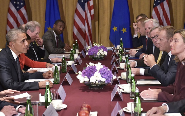 US President Barack Obama (L) meets European Council President Donald Tusk (3rdR), European Commission President Jean-Claude Juncker (4thR) and EU High Representative for Foreign Affairs and Security Federica Mogherini (R) on the sidelines of the NATO Summit at a hotel in Warsaw on July 8, 2016. The Polish capital hosts a two-day NATO summit, the first time ever that it hosts a top-level meeting of the Western military alliance which it joined in 1999. / AFP / MANDEL NGAN (Photo credit should read MANDEL NGAN/AFP/Getty Images)