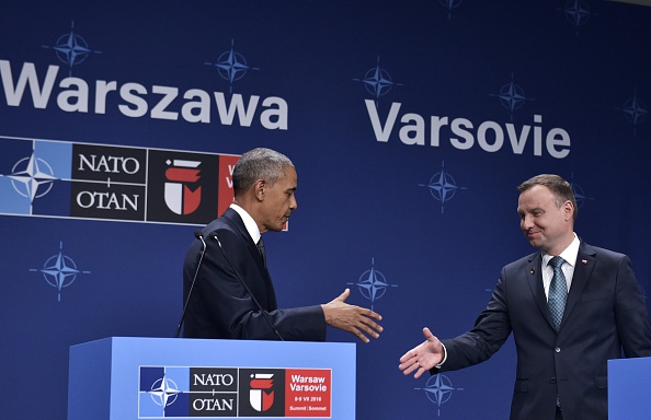 US President Barack Obama (L) and Poland's President Andrzej Duda (R) shake hands during a press conference following a bilateral meeting on the sidelines of the NATO Summit in Warsaw, Poland, on July 8, 2016. The Polish capital Warsaw hosts a two-day top-level NATO meeting, first time since Poland joined the alliance in 1999. / AFP / MANDEL NGAN (Photo credit should read MANDEL NGAN/AFP/Getty Images)