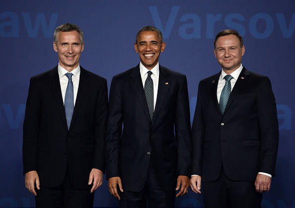 Poland's President Andrzej Duda (R), NATO Secretary General Jens Stoltenberg (L) and US President Barack Obama (C) pose for a picture prior to the opening of the NATO summit on July 8, 2016 at the Belweder Palace in Warsaw, Poland. The Polish capital Warsaw hosts a two-day top-level NATO meeting, for the first time since Poland joined the alliance in 1999. / AFP / STEPHANE DE SAKUTIN (Photo credit should read STEPHANE DE SAKUTIN/AFP/Getty Images)