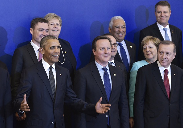 From left: US President Barack Obama, Britain's Prime Minister David Cameron, and Turkey's President Recep Tayyip Erdogan pose for a family photo ahead of a working dinner at the Presidential Palace during the NATO Summit in Warsaw on July 8, 2016. The Polish capital Warsaw hosts a two-day top-level NATO meeting, first time since Poland joined the alliance in 1999. / AFP / MANDEL NGAN (Photo credit should read MANDEL NGAN/AFP/Getty Images)
