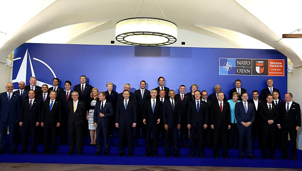 WARSAW, POLAND - JULY 8: NATO Head of States and Governments with Polish President Andrzej Duda (C-L), NATO Secretary General Jens Stoltenberg (C), US President Barack Obama (C-R) and President of Turkey Recep Tayyip Erdogan (4th L) pose for a group photo during the official dinner hosted by Polish President at the Presidential Palace as a part of the NATO Summit in Warsaw, Poland, 08 July 2016. (Photo by Turkish Presidency / Yasin Bulbul/Anadolu Agency/Getty Images)