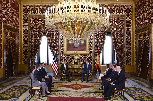 US President Barack Obama (L) takes part in a bilateral meeting with Spain's King Felipe (R) at the Palacio Real de Madrid in Madrid, Spain on July 10, 2016. Obama said he will cut short a foreign trip and visit Dallas next week as the shooting rampage by the black army veteran, who said he wanted to kill white cops, triggered urgent calls to mend troubled race relations in the United States. / AFP / MANDEL NGAN (Photo credit should read MANDEL NGAN/AFP/Getty Images)