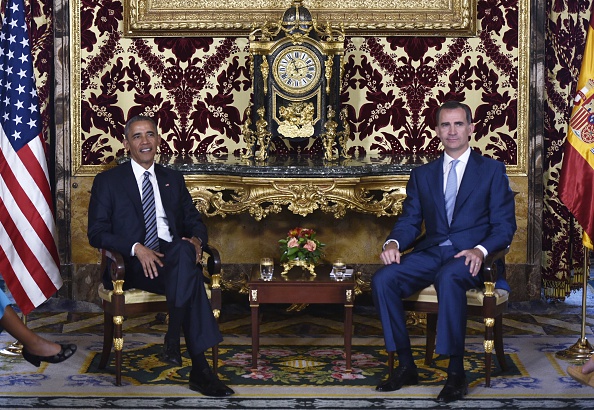 US President Barack Obama (L) takes part in a bilateral meeting with Spain's King Felipe (R) at the Palacio Real de Madrid in Madrid, Spain on July 10, 2016. Obama said he will cut short a foreign trip and visit Dallas next week as the shooting rampage by the black army veteran, who said he wanted to kill white cops, triggered urgent calls to mend troubled race relations in the United States. / AFP / Mandel Ngan (Photo credit should read MANDEL NGAN/AFP/Getty Images)