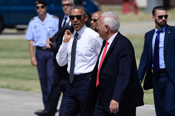 Spanish Minister of Foreign Affairs and Cooperation Jose Garcia-Margallo (2ndR) accompanies US president Barack Obama (L) on his way to his plane at Torrejon de Ardoz airport on July 10, 2016. Obama said he will cut short a foreign trip and visit Dallas next week as the shooting rampage by the black army veteran, who said he wanted to kill white cops, triggered urgent calls to mend troubled race relations in the United States. / AFP / JAVIER SORIANO (Photo credit should read JAVIER SORIANO/AFP/Getty Images)
