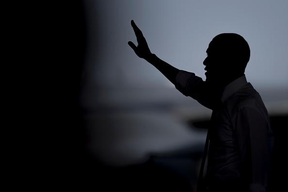 US president Barack Obama waves after speaking to service members at the Naval Station Rota, in Rota, southwestern Spain on July 10, 2016 Obama said he will cut short a foreign trip and visit Dallas next week as the shooting rampage by the black army veteran, who said he wanted to kill white cops, triggered urgent calls to mend troubled race relations in the United States. / AFP / JORGE GUERRERO (Photo credit should read JORGE GUERRERO/AFP/Getty Images)