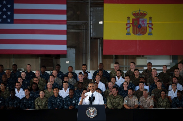 US president Barack Obama speaks to service members at the Naval Station Rota, in Rota, southwestern Spain on July 10, 2016 Obama said he will cut short a foreign trip and visit Dallas next week as the shooting rampage by the black army veteran, who said he wanted to kill white cops, triggered urgent calls to mend troubled race relations in the United States. / AFP / JORGE GUERRERO (Photo credit should read JORGE GUERRERO/AFP/Getty Images)