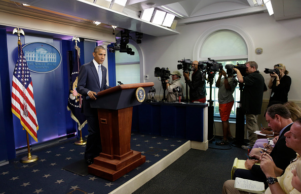 US President Barack Obama makes a statement at the White House in Washington about police officers deadly shooting in Baton Rouge on July 17, 2016. Obama condemned as "cowardly" a shooting that killed three police officers and wounded three more in the Louisiana capital of Baton Rouge on Sunday. / AFP / YURI GRIPAS (Photo credit should read YURI GRIPAS/AFP/Getty Images)
