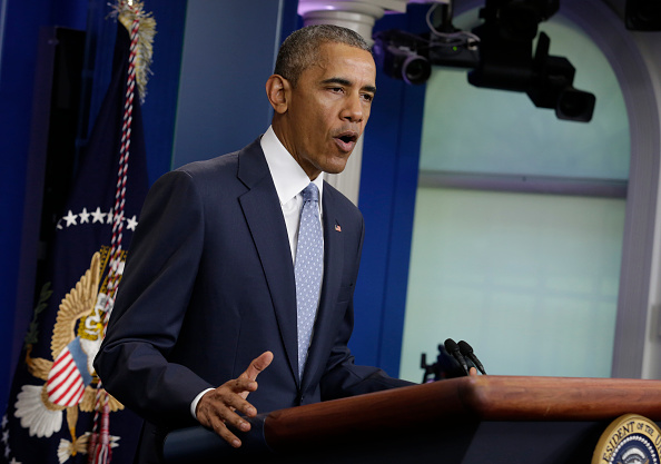 US President Barack Obama makes a statement at the White House in Washington about police officers deadly shooting in Baton Rouge on July 17, 2016. Obama condemned as "cowardly" a shooting that killed three police officers and wounded three more in the Louisiana capital of Baton Rouge on Sunday. / AFP / YURI GRIPAS (Photo credit should read YURI GRIPAS/AFP/Getty Images)