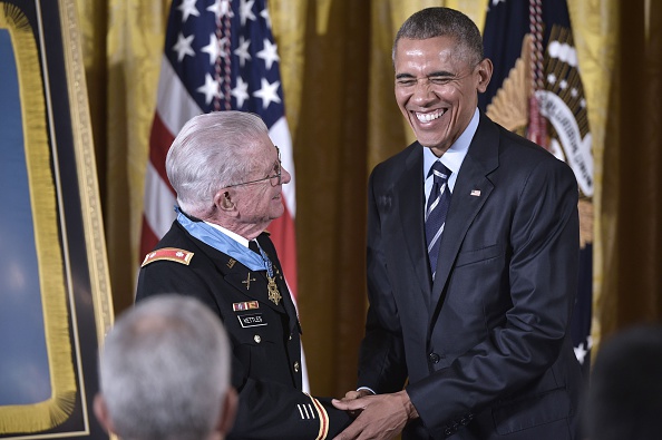 US President Barack Obama shakes hands with retired US Army Lt. Colonel Charles Kettles after presenting him with the Medal of Homor during a ceremony in the East Room of the White House on July 18, 2016 in Washington, DC. Lt. Colonel Kettles was awarded the Medal of Honor for conspicuous gallantry while serving in Vietnam. / AFP / MANDEL NGAN (Photo credit should read MANDEL NGAN/AFP/Getty Images)